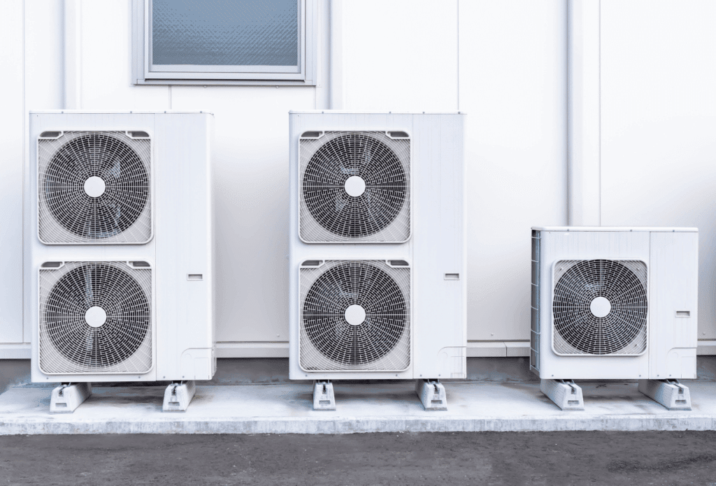 A picture of air conditioning units being installed.