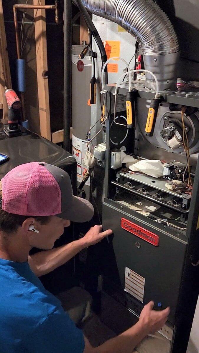 a picture of a technician fixing high static pressure